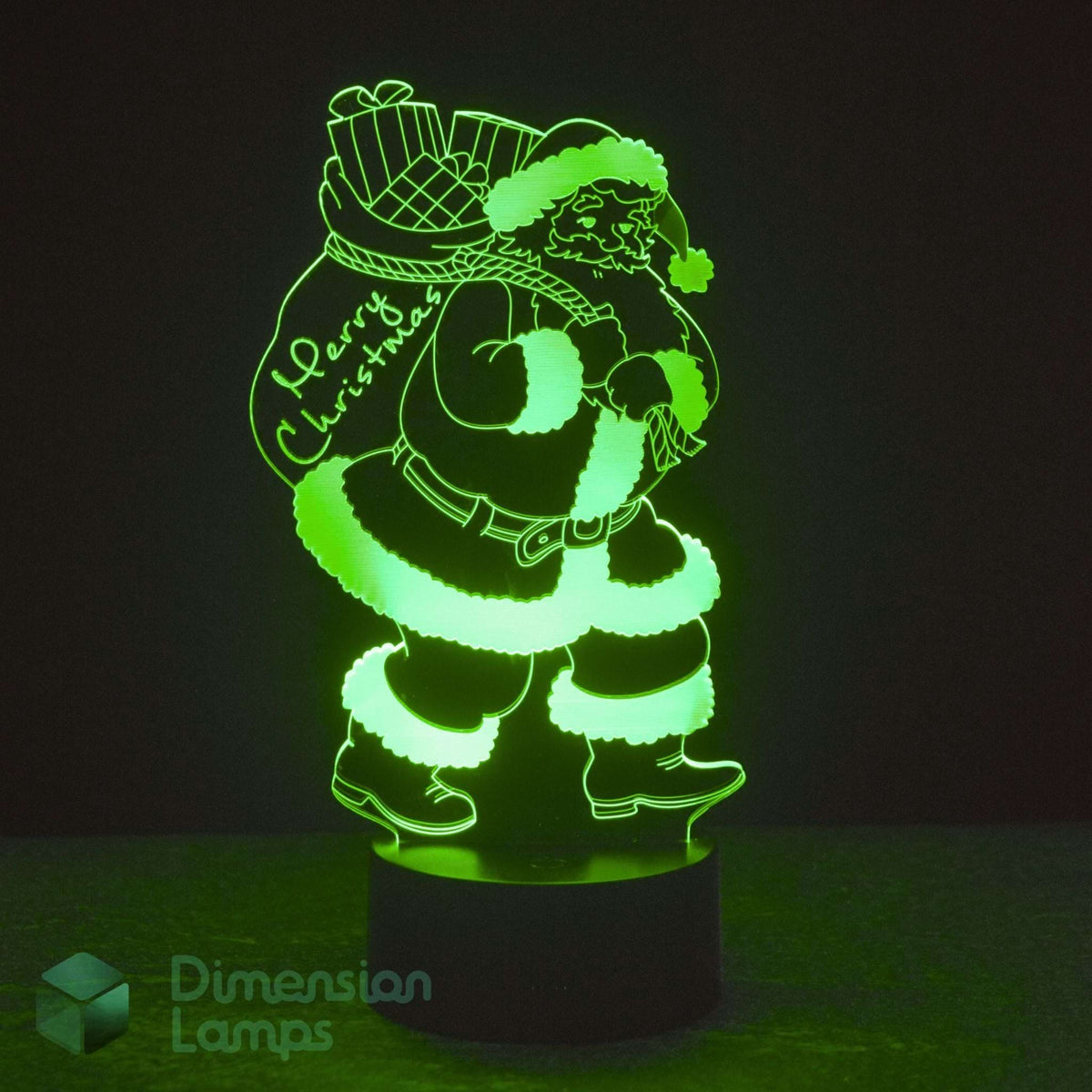 A glowing green 3D LED lamp of Santa Claus carrying a Christmas sack, on a dark background with a 'Dimension Lamps' logo in the lower-left corner.