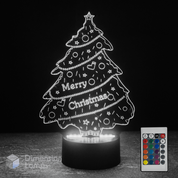 Christmas tree-shaped LED lamp with remote control on a dark background
