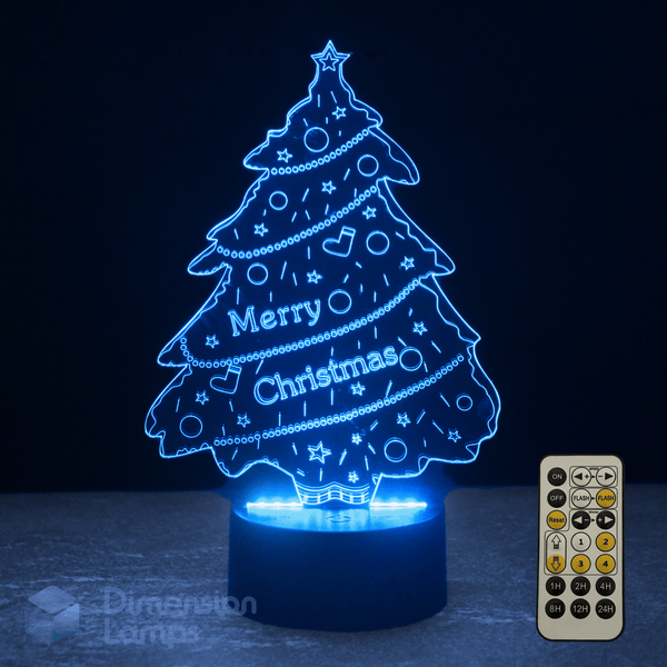 Christmas tree-shaped night light with 'Merry Christmas' text and remote control on a dark background