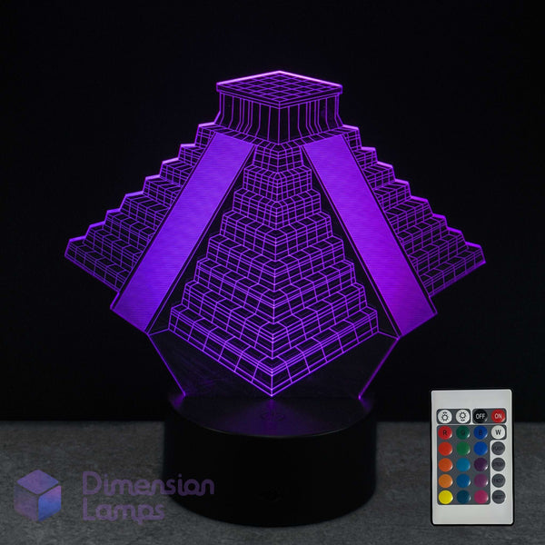 3D pyramid-shaped lamp with purple lighting effect and remote control on a dark background. Ancient structure gift idea. 