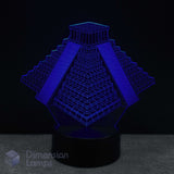 3D pyramid-shaped lamp emitting a blue light on a dark background. Mesoamerican Pyramid design. 