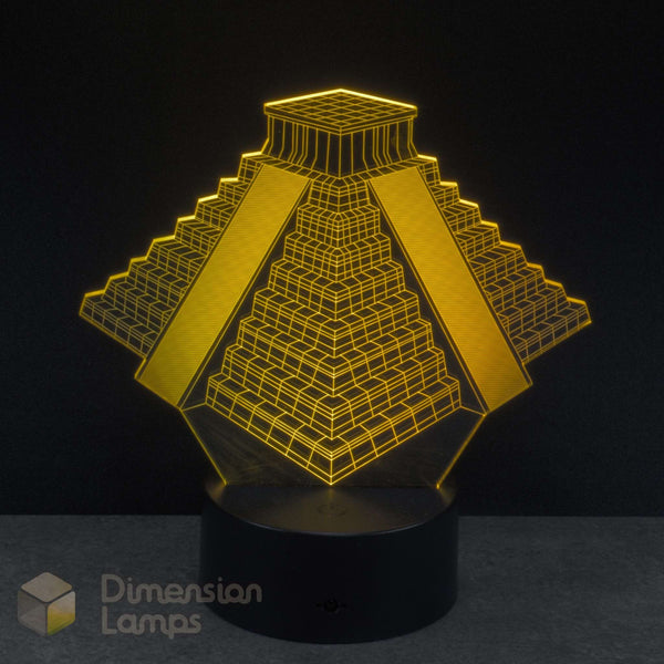 3D pyramid-shaped lamp with glowing yellow lines on a black background, featuring the brand 'Dimension Lamps'.