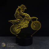 Motorcycle and rider silhouette lamp on a black background with 'Dimension Lamps' branding. Gift idea for dirt bike riders.