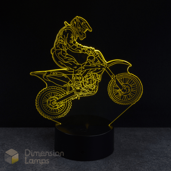 Motorcycle and rider silhouette lamp on a black background with 'Dimension Lamps' branding. Gift idea for dirt bike riders.