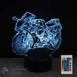 Motorcycle-shaped LED lamp with remote control on a dark background. Gift idea for Supersport and Sports Bike fans.