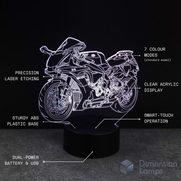 Motorcycle-shaped night light with technical details on a black background. Gift idea for teens.