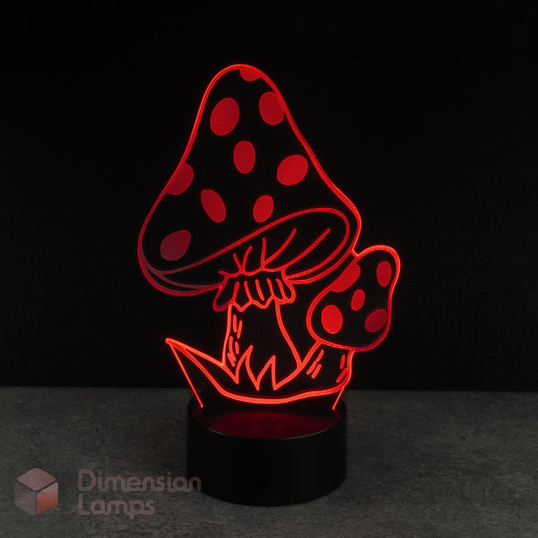 Mushroom-shaped lamp with red polka dot design on a dark background, featuring the brand 'Dimension Lamps'.