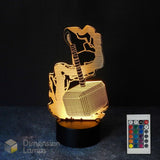 A 3D optical illusion night light shaped like Thor's hammer (Mjolnir) on a black base, shown illuminated against a dark background with a 16 colour remote control and a 'Dimension Lamps' logo overlay.