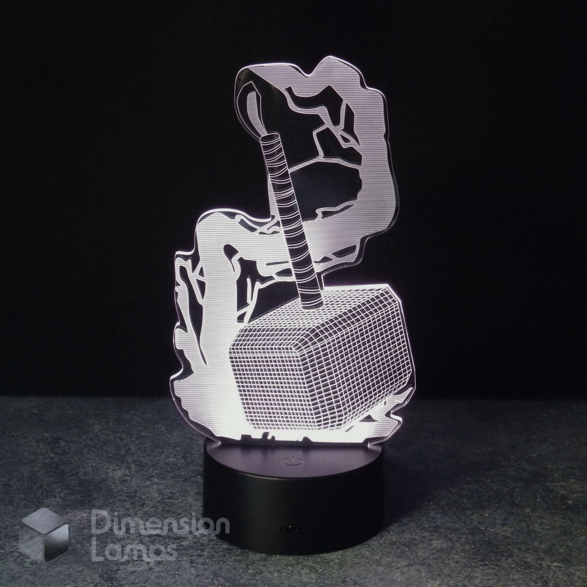 A 3D optical illusion LED night light depicting Thor holding his hammer Mjolnir, illuminated on a black circular base against a dark background. A watermark for 'Dimension Lamps' is visible in the bottom-left corner.
