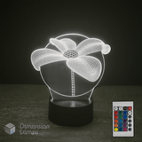 3D daisy lily flower lamp with remote control on a dark background