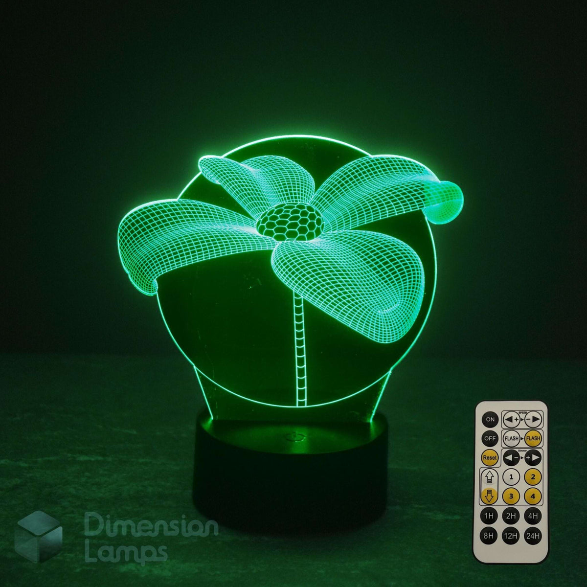 3D daisy lily flower lamp with 7 colour remote control with sleep timer buttons on a dark background. Ornamental flower gift idea for flower fans.