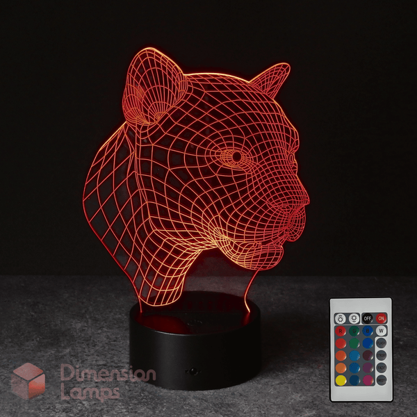 3D wireframe panther head lamp with remote control on a dark background