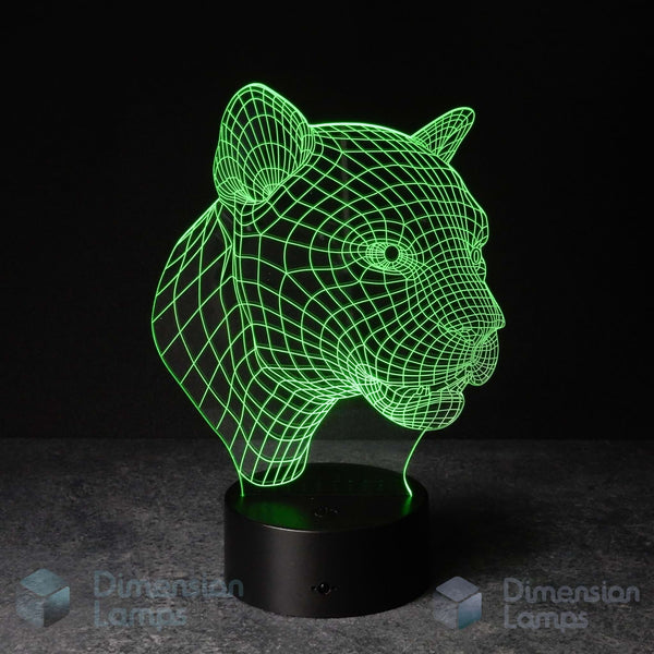 A 3D optical illusion lamp shaped like a panther head, glowing with bright green wireframe lines on a black base against a dark background. Gift idea for panther lovers.