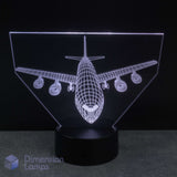 An LED acrylic 3D illusion lamp featuring a white wireframe airplane design on a black base, photographed against a dark background. Kids airplane gift idea.