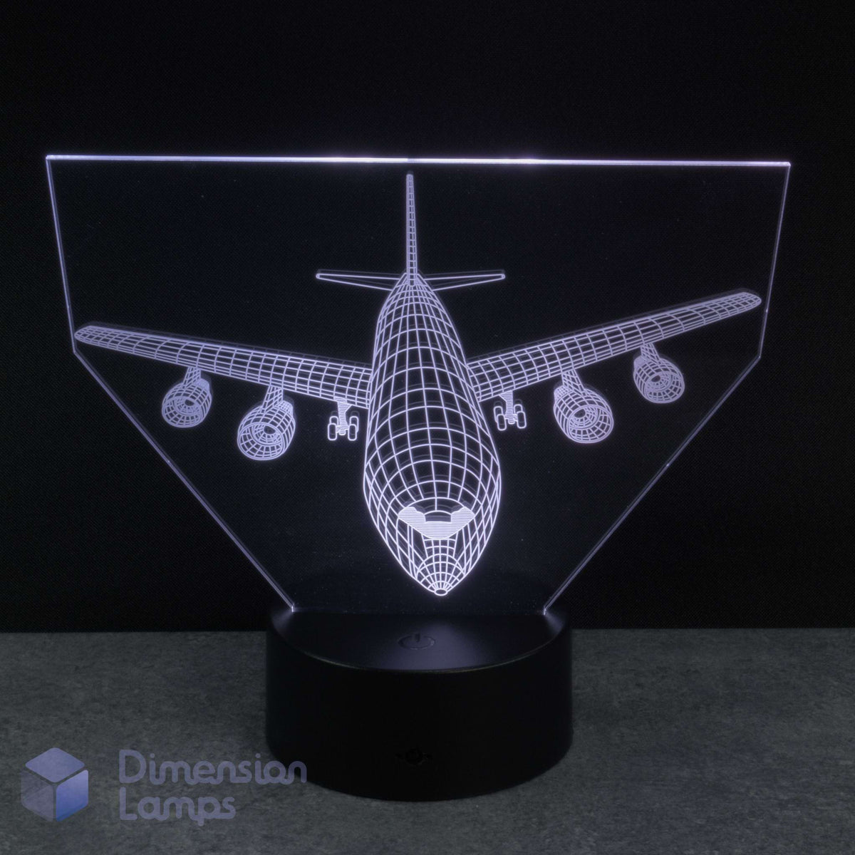 An LED acrylic 3D illusion lamp featuring a white wireframe airplane design on a black base, photographed against a dark background. Kids airplane gift idea.