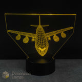 3D airplane-shaped lamp with a black base on a dark background. Airplane gift for kids.