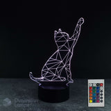 A 3D optical illusion lamp shaped like a sitting cat with a raised paw, emitting a white geometric light on a black base. A white remote control is shown to the right, and the brand name 'Dimension Lamps' in the lower-left corner against a dark background.