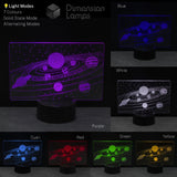An LED solar system 3D illusion night light shown in multiple colour modes purple, blue, white, cyan, red, green, and yellow. Kids astronomy gift. 