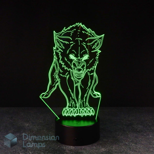Detailed wolf 3D lamp: green faceted design of a wolf with glowing eyes and visible teeth, standing on a patterned base against a dark background. A cool gift for teens' room decor in Australia. 