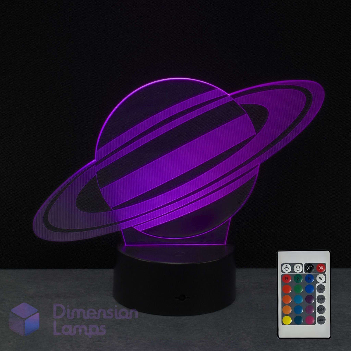 A 3D acrylic night light of Saturn, glowing with a purple light and rings on a black base, shown with its remote control and a 'Dimension Lamps' logo.