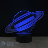 A 3D optical illusion LED night light of Saturn, glowing with a vibrant blue light on a black base against a dark black background. Kids space gift.