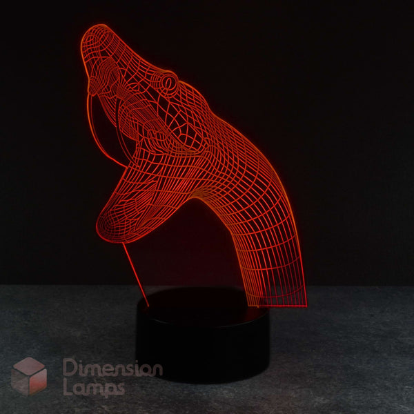 A 3D optical illusion lamp depicting a red snake, glowing with light on a black base against a dark background. A 'Dimension Lamps' logo is visible in the bottom-left corner. Snake lovers gift idea. 