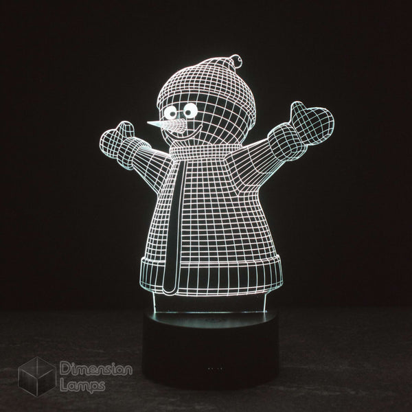 3D illusion lamp depicting a snowman with a black outline on clear acrylic, illuminated from behind by LED lights.