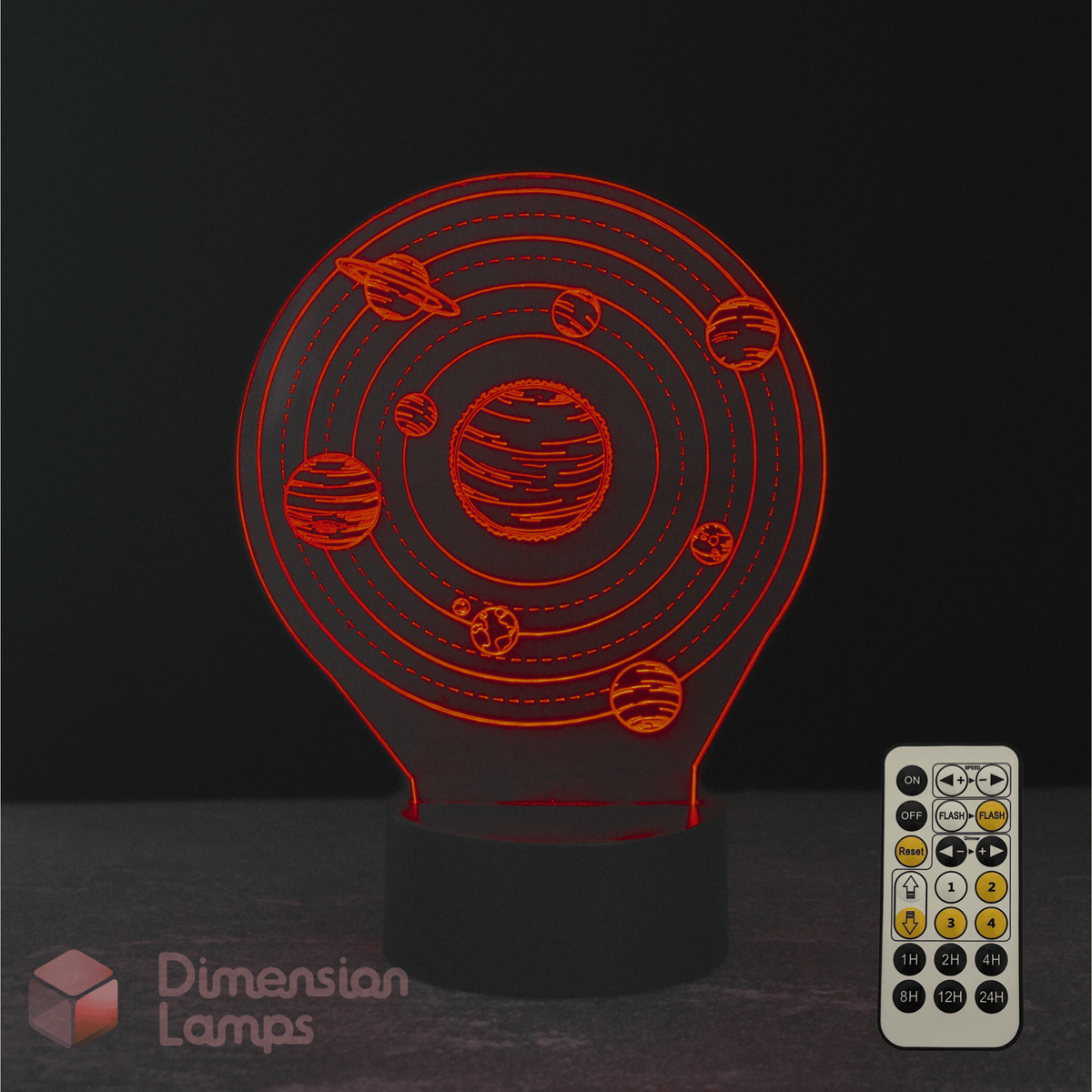 3D solar system lamp with remote control on a dark background