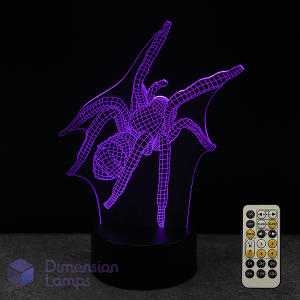 3D spider-shaped lamp with purple light and remote control on a dark background. Spider collectors gift idea.