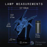 A dimension diagram of a 3D acrylic spider lamp on a black base, showing measurements of 15cm width, 17cm height, 21cm total height, 4cm base height, 8.5cm base width, and 4mm acrylic thickness, with the brand 'Dimension Lamps' in the corner.