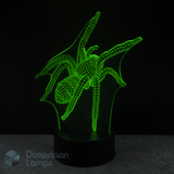 3D LED lamp shaped like a spider on a black background with 'Dimension Lamps' branding.