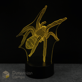 Spider-shaped lamp with yellow wireframe design on a black background, featuring the brand 'Dimension Lamps'.