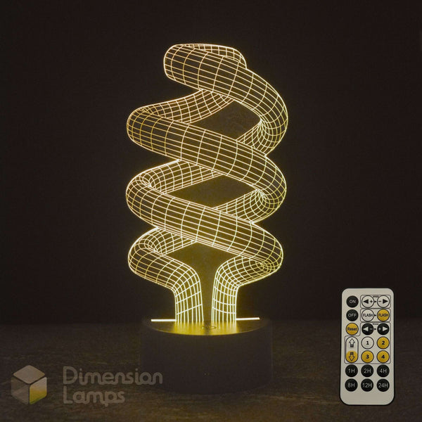 A 3D optical illusion spiral LED night light glowing with a warm yellow light, a 7 colour remote control and a Dimension Lamps logo is visible.