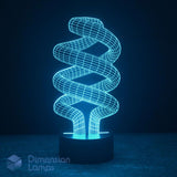 A 3D optical illusion spiral LED night light glowing cyan on a black base against a dark background. A Dimension Lamps logo in the bottom-left corner.