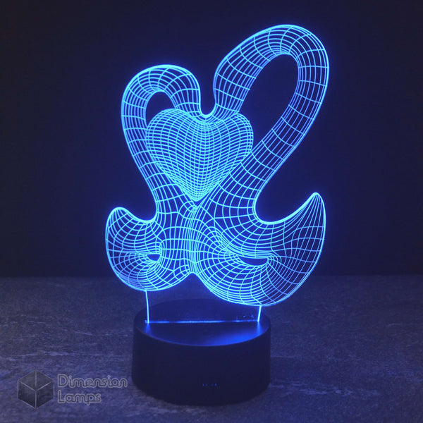 A serene blue Swan Heart LED 3D illusion lamp, perfect as a calming night light.
