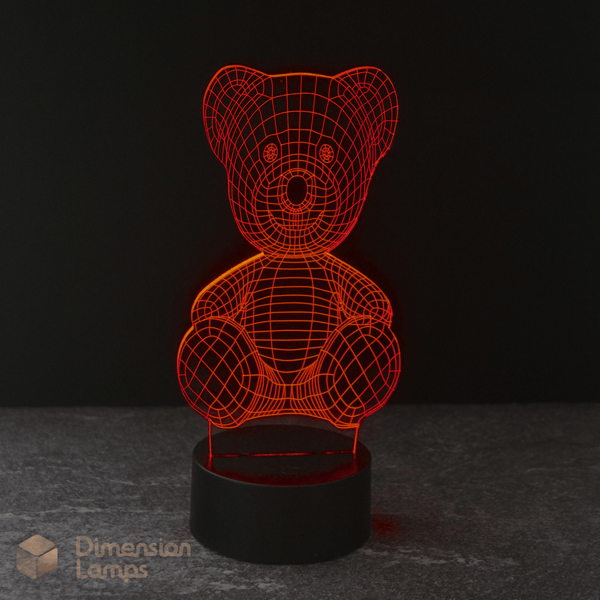 Looking for a comforting night light for toddlers? This Teddy Bear 3D lamp emits a soft red glow.