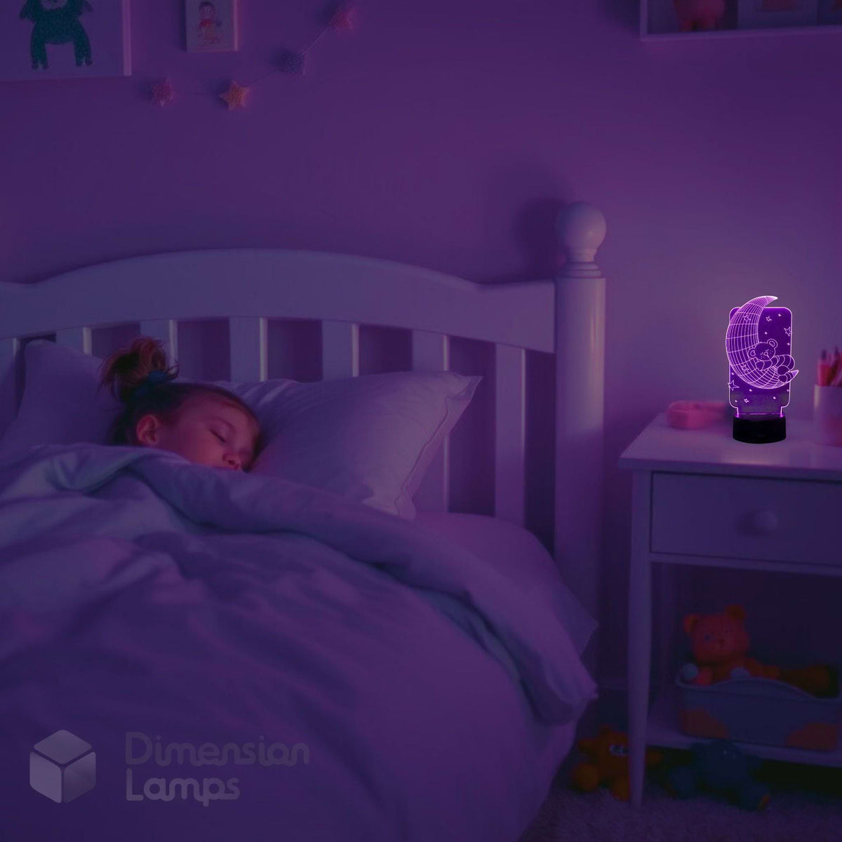 A 3D illusion night light shaped like a cartoon character glows purple on a bedside table next to a bed where a child is sleeping, by Dimension Lamps.