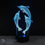 3D lamp with dolphin design on a black background. Gift idea for dolphin fans.