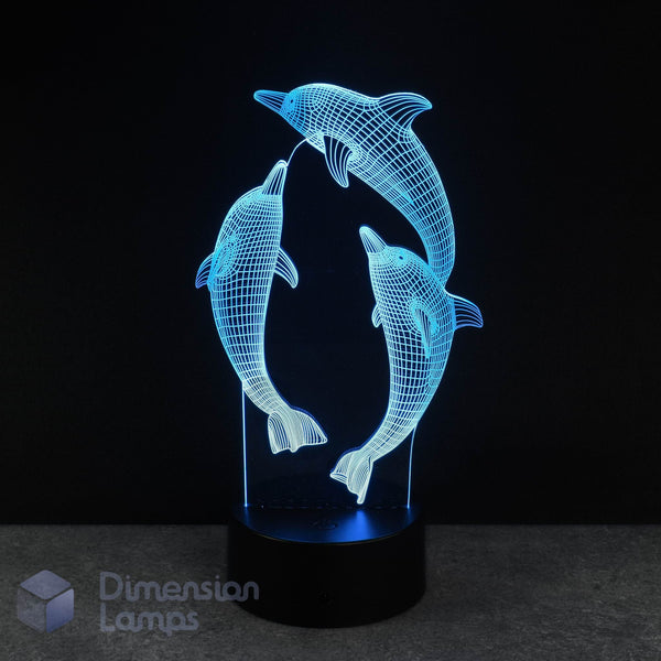 3D lamp with dolphin design on a black background. Gift idea for dolphin fans.