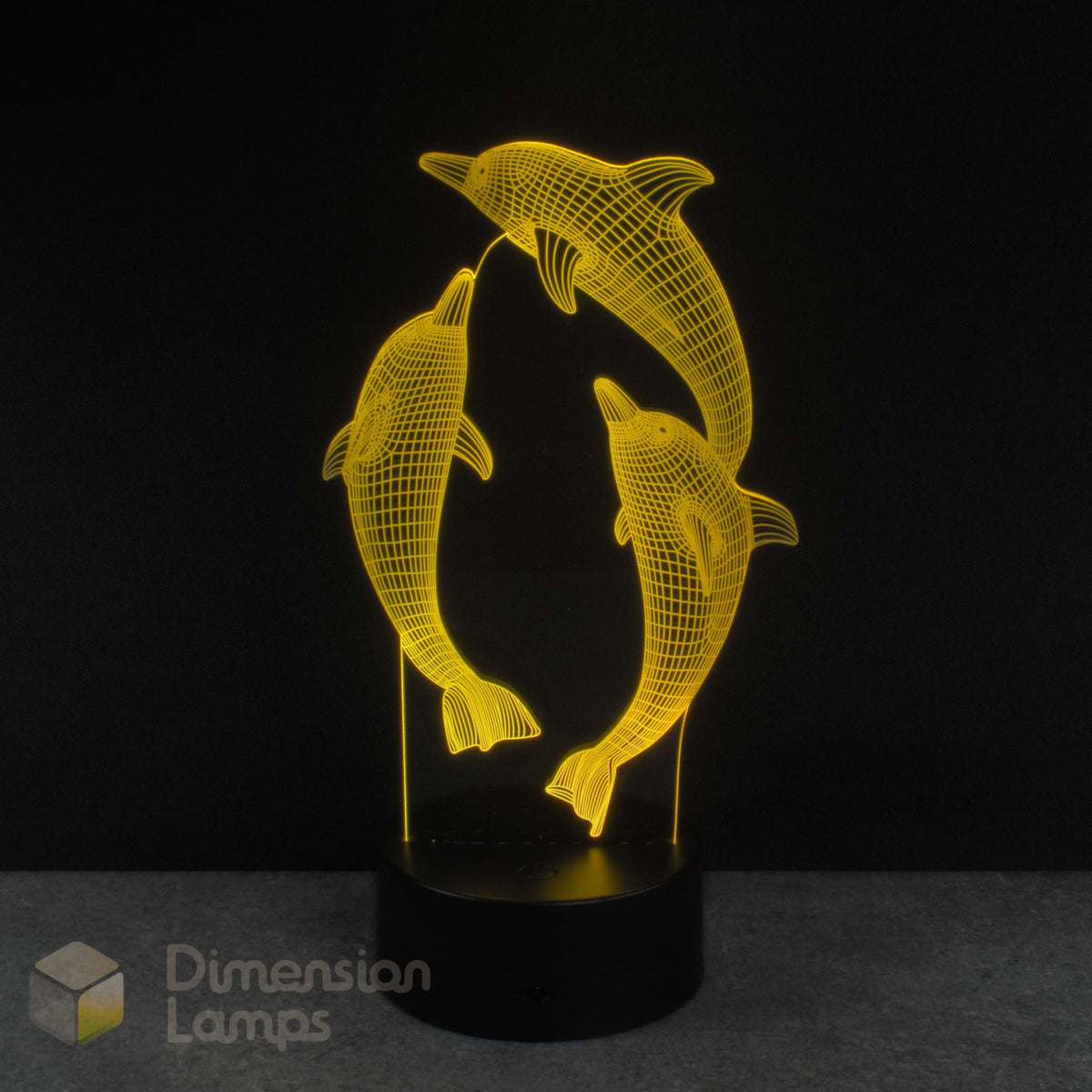 3D LED lamp with dolphin design on a black background. Kids night light idea.