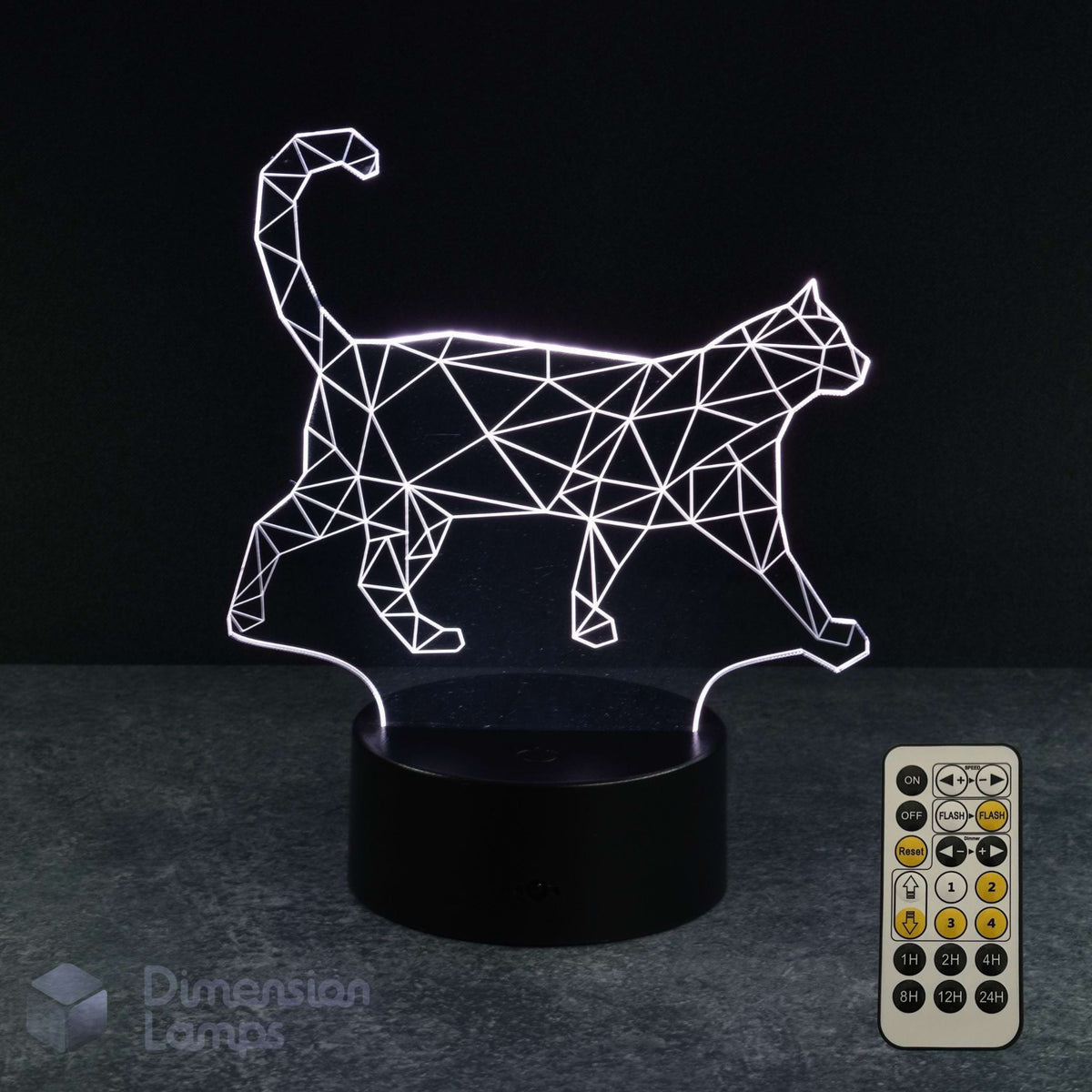 A 3D optical illusion lamp shaped like a walking cat, emitting a white geometric line pattern, resting on a black cylindrical base with a 7 colour sleep timer remote control shown on the right. The background is a dark studio setting.
