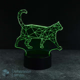 A 3D optical illusion LED night light shaped like a walking cat, glowing with a bright green geometric line pattern on a black cylindrical base, set against a dark background. Thoughtful gift for cat lovers.