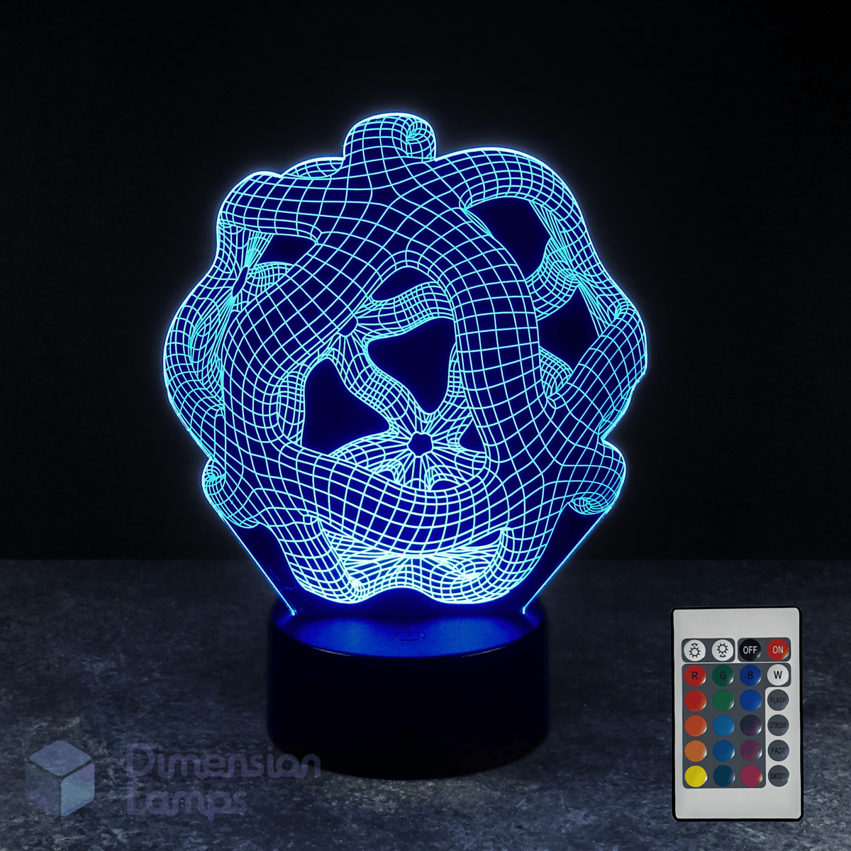 3D LED lamp with a warped reality design and remote control on a dark background.