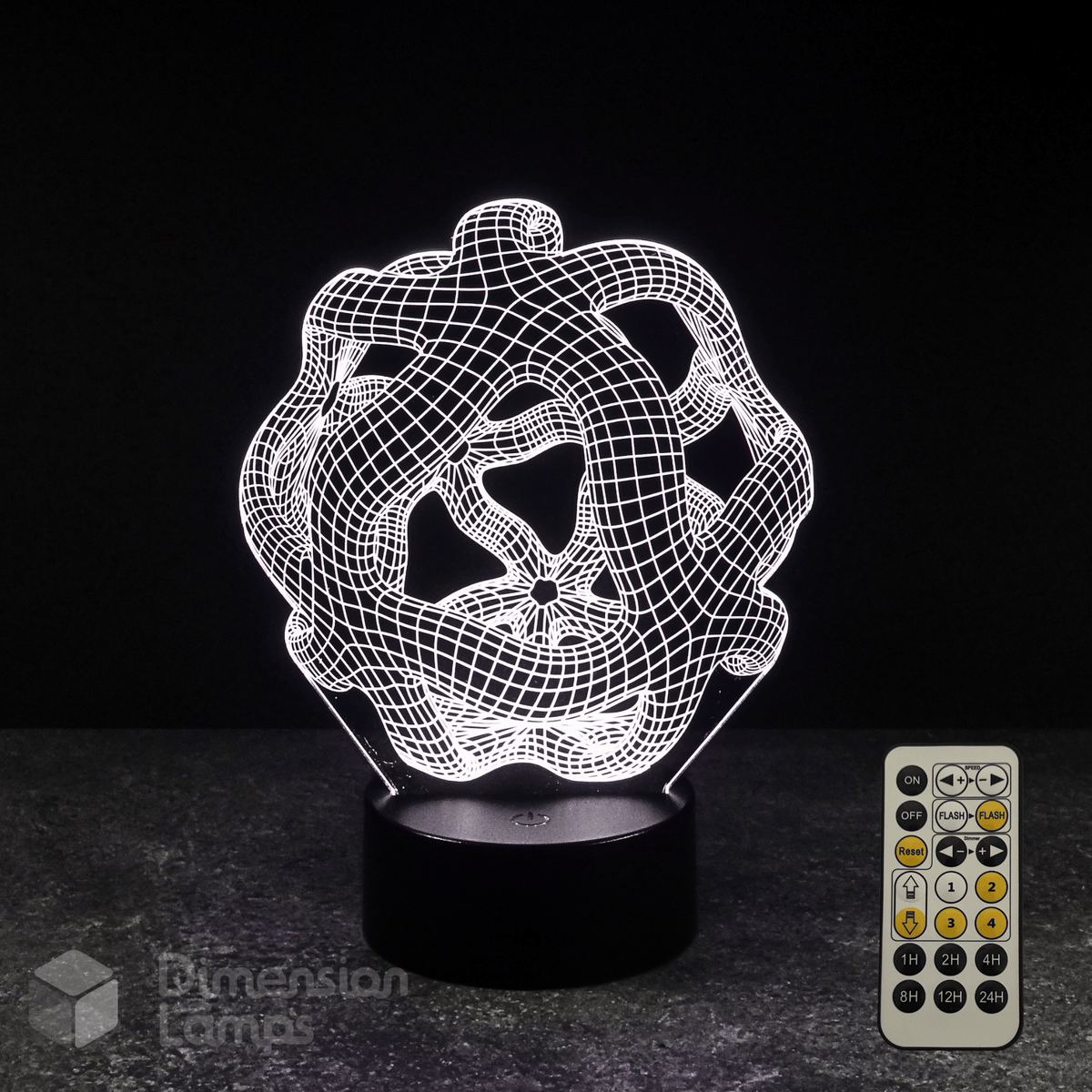 3D geometric design lamp with remote control on a dark background