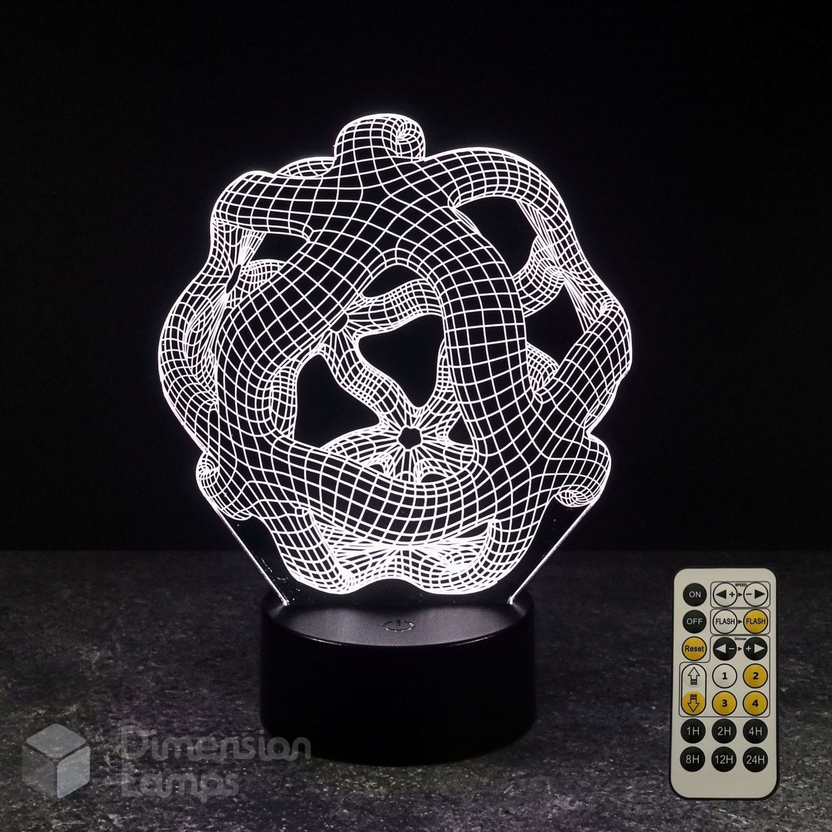 A 3D optical illusion lamp with a white wireframe warped space design on a black base, shown alongside its 7 colour sleep timer remote control against a dark background.