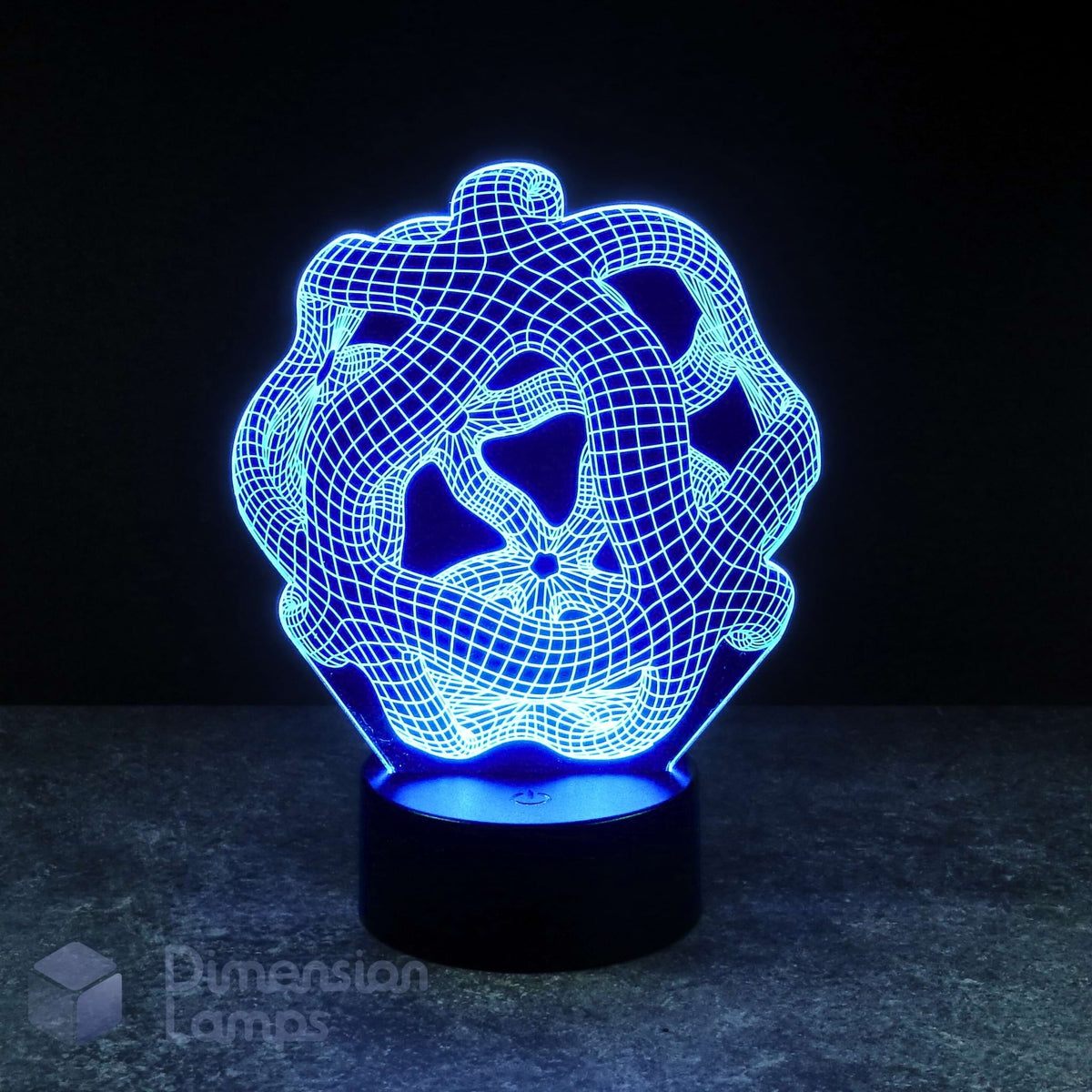 A 3D optical illusion LED night light with a glowing blue wireframe knot design on a black cylindrical base, set against a dark background.