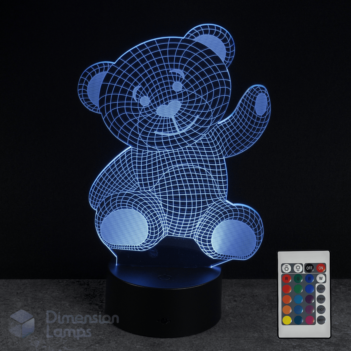 3D teddy bear lamp with remote control on a dark background. Baby shower gift idea.