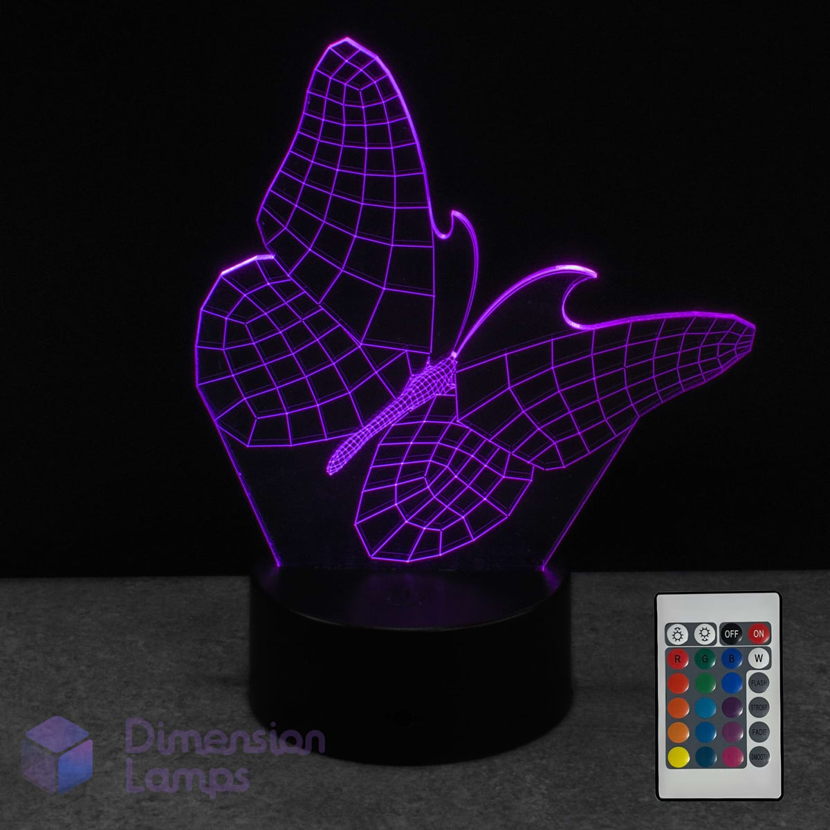 Wireframe butterfly-shaped LED lamp with remote control on a dark background