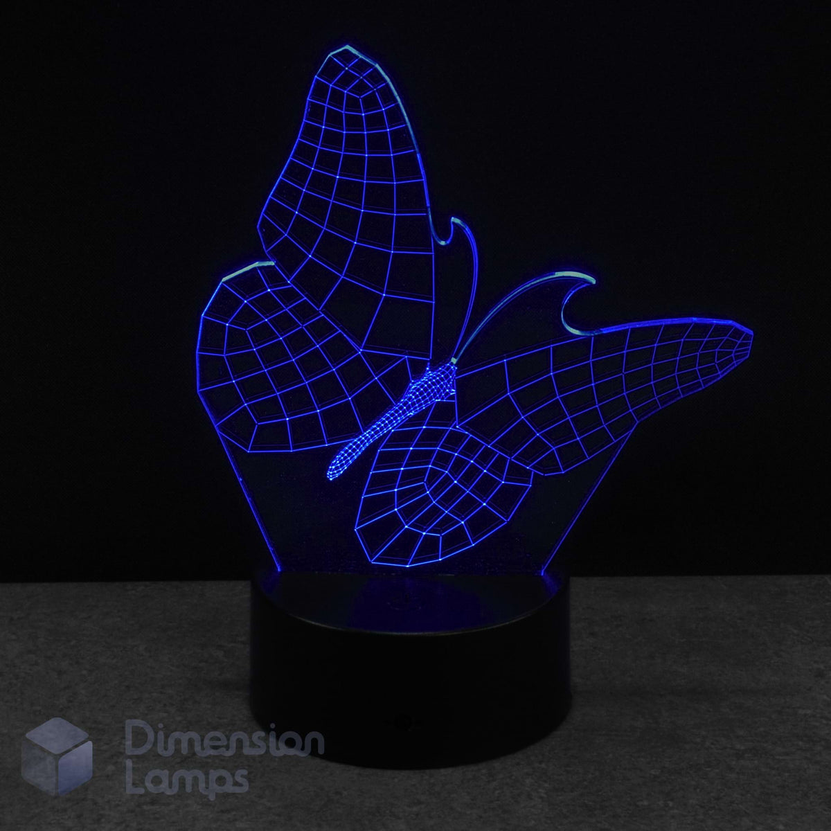 Butterfly-shaped night light with blue LED illumination on a dark background. Kids night light idea.