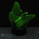 Green wireframe butterfly-shaped lamp on a black background with 'Dimension Lamps' branding. Girls gift idea.